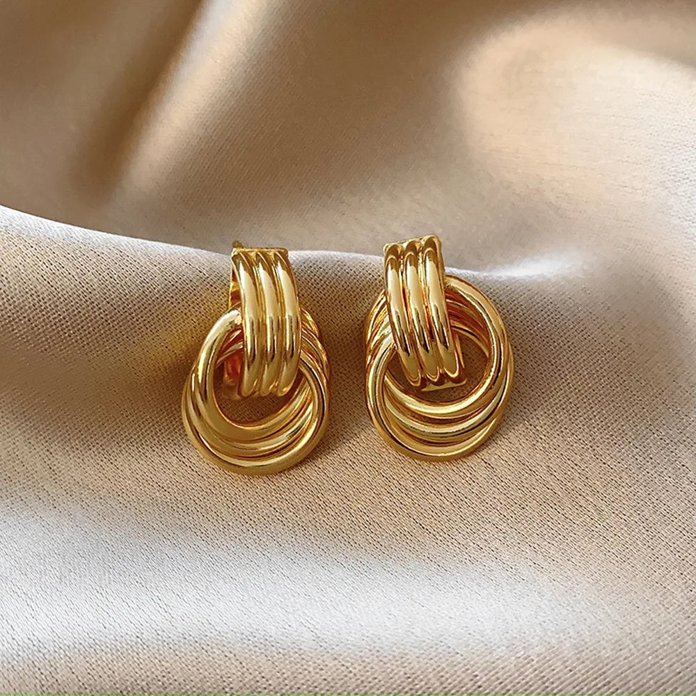 Boucles Éventail Doré Géométrique