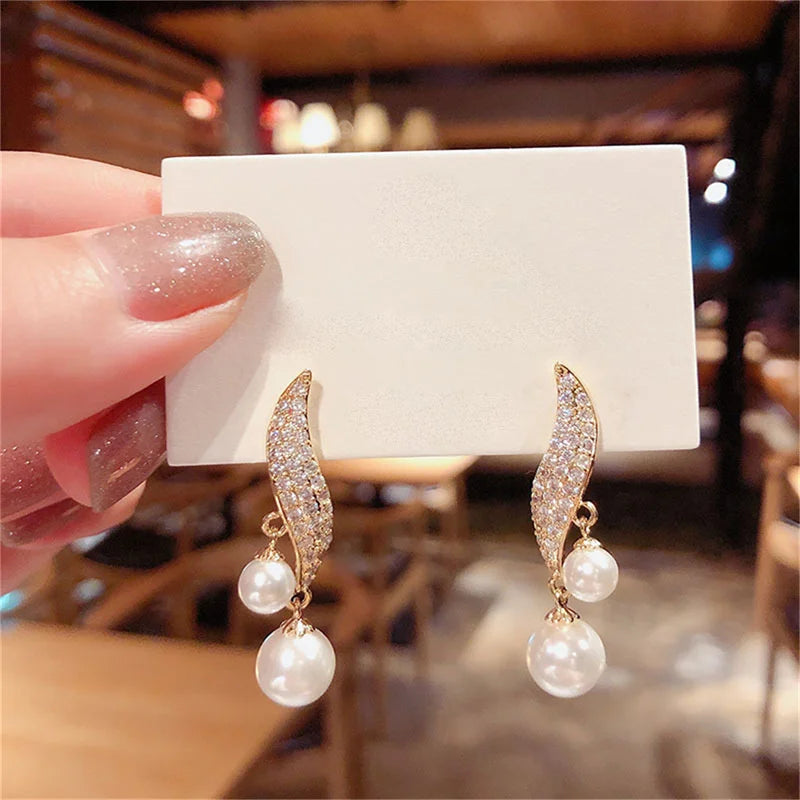 Boucles d'oreilles classiques et élégantes pour femmes, Imitation Double perle, longues pampilles en cristal, goutte d'eau, bijoux cadeaux de mariage, nouvelle collection 2023 L’AURA