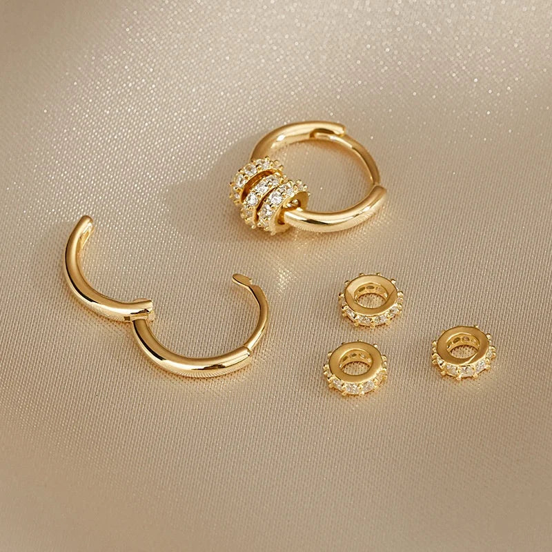 Boucles d'oreilles Huggie créoles en acier inoxydable plaqué or, délicates et scintillantes, Design en grappe CZ, bijoux élégants hypoallergéniques pour femmes L’AURA