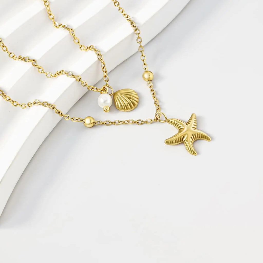 Collier de coquillage pour femmes, plaqué or 14 carats, en acier inoxydable, superposé, étoile de mer, conque, perle, collier à breloques, bijoux de plage d'été L’AURA