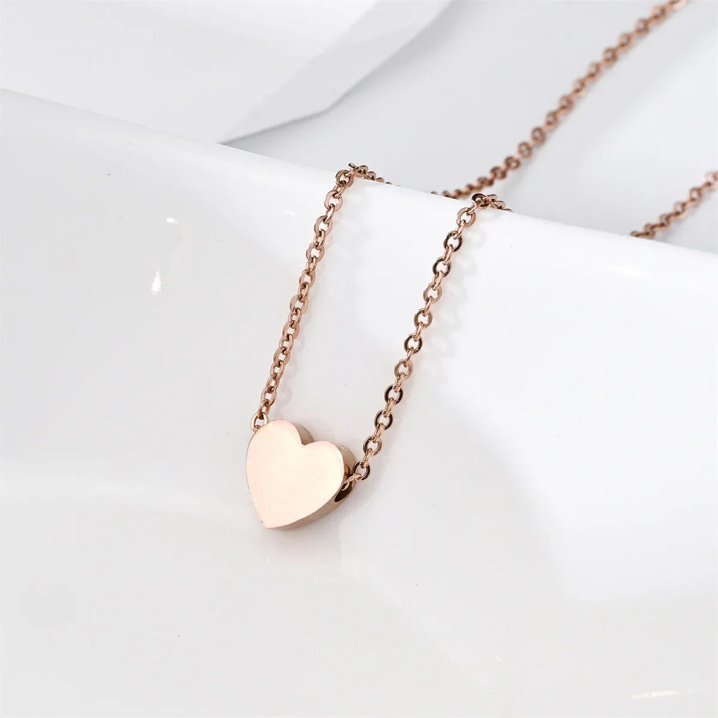 Colliers simples en acier inoxydable, pendentif en forme de cœur, pour femmes et filles, ras du cou délicat hypoallergénique en acier inoxydable