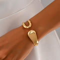Bracelet ouvert pour femme tendance avec un design géométrique creux élégant et polyvalent, idéal pour un usage quotidien L’AURA