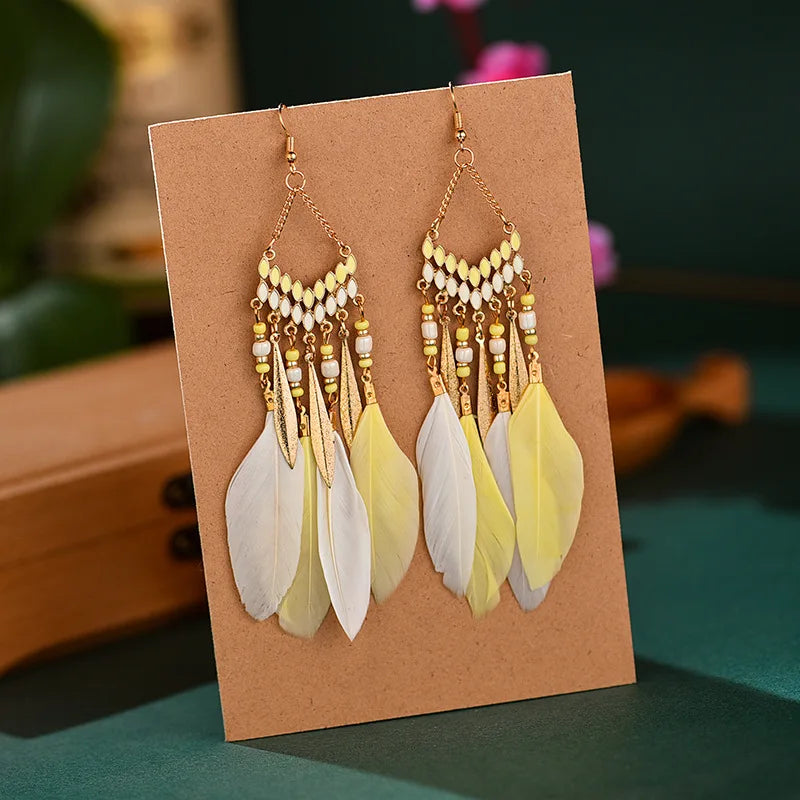 Boucles d'oreilles ethniques en plumes pour femmes, style bohème, longues pampilles, perles, goutte d'eau, accessoires bijoux de fête à la mode pour filles, nouvelle collection L’AURA
