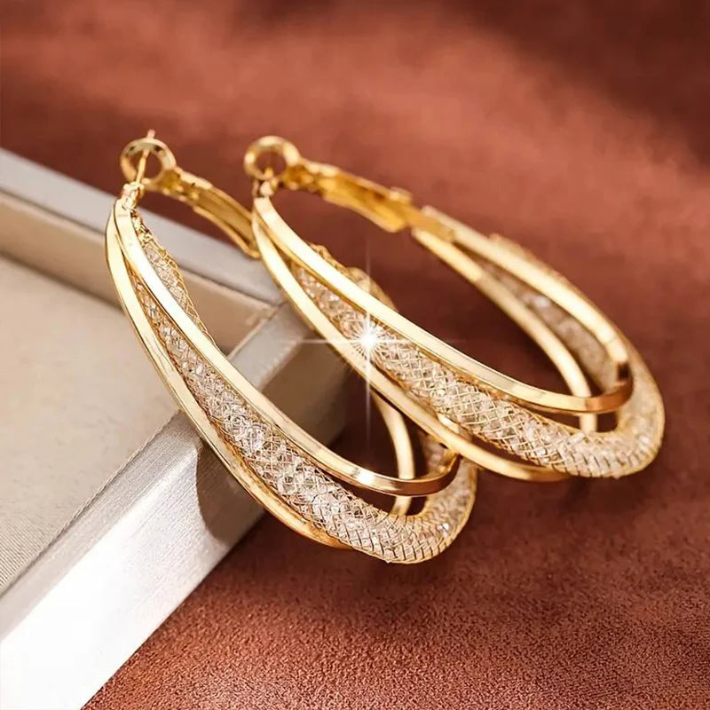 Boucles d'oreilles créoles en pierre de cristal couleur or, forme métallique torsadée, plaqué argent, nouvelle mode pour femmes, bijoux de fête, cadeau d'anniversaire L’AURA