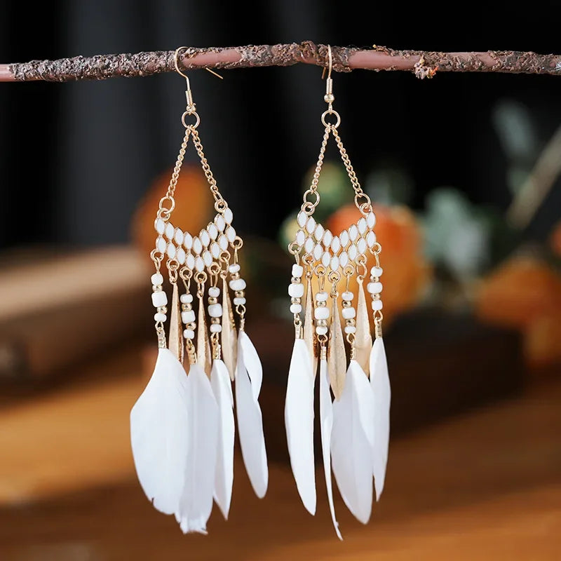 Boucles d'oreilles ethniques en plumes pour femmes, style bohème, longues pampilles, perles, goutte d'eau, accessoires bijoux de fête à la mode pour filles, nouvelle collection L’AURA
